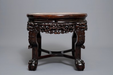 A Chinese wooden stand with marble top and mother of pearl inlay, 19/20th C.