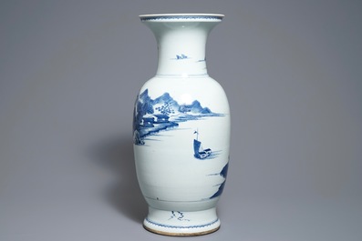 A Chinese blue and white landscape vase, 19th C.