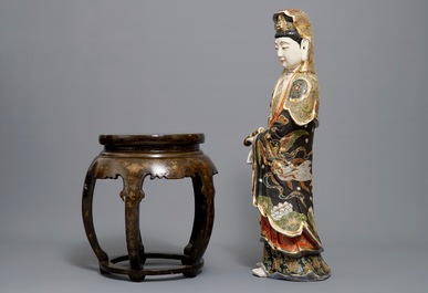 A large Japanese Satsuma figure of Kannon on laquered wooden stand, Meiji, 19/20th C.