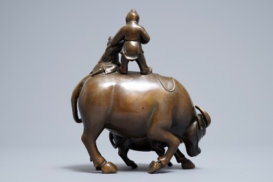 A Chinese bronze group with boys and buffaloes, 19th C.