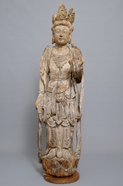 A tall Chinese carved wood figure of Guanyin, Ming
