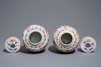 A pair of Chinese Imari style ginger jars and covers, Kangxi
