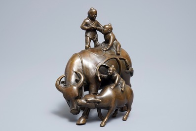 A Chinese bronze group with boys and buffaloes, 19th C.