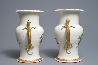 A pair of Chinese 'European subject' dragon-handle vases, Qianlong