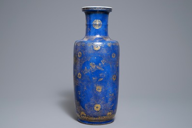 A Chinese powder blue and gilt rouleau vase, Kangxi