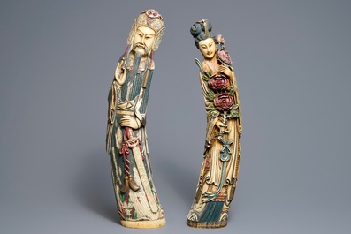 Une paire de grandes figures polychromes en ivoire sculpt&eacute;, Chine, 19&egrave;me
