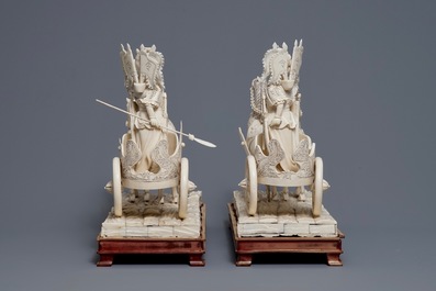 A pair of large Chinese ivory 'warriors on horse chariots' groups, late 19th C.