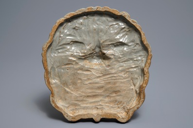 A Korean celadon-glazed mask, Goryeo or later