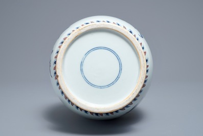A Chinese blue, white and underglaze red 'sanduo' vase, 19/20th C.