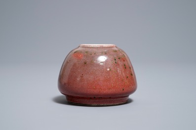 A Chinese peachbloom-glazed brush washer, Kangxi mark, 19th C.