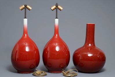 Three Chinese sang-de-boeuf-glazed bottle vases, 20th C.