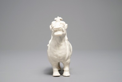 A Chinese Dehua blanc de Chine model of a man on a qilin, Kangxi