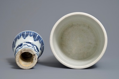 A Chinese blue and white jardini&egrave;re and an inscribed candlestick, 18/19th C.