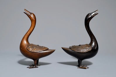 A pair of Chinese bronze duck-shaped incense burners and covers, 18th C.