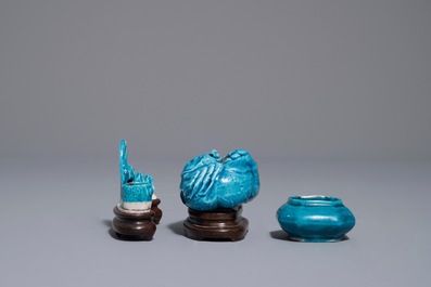 A Chinese turquoise-glazed brush rest and two small brushwashers, Kangxi
