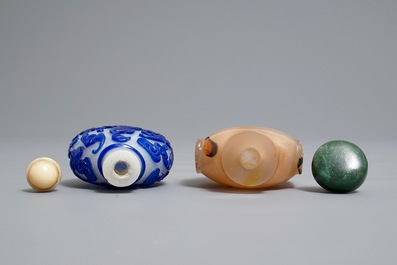 Two Chinese agate and overlay glass snuff bottles, 19/20th C.