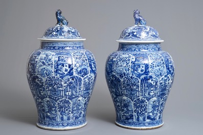 A pair of large Chinese blue and white vases and covers, Kangxi