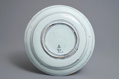 A Dutch Delft blue and white kraak-style chinoiserie dish, last quarter 17th C.