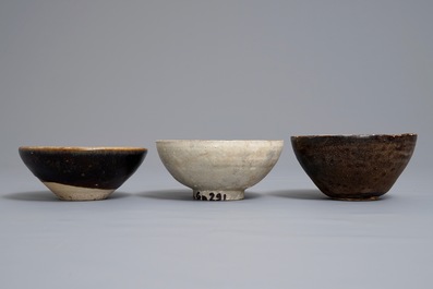Three Chinese black-, brown- and cream-glazed bowls, Song and later