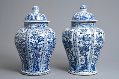 A pair of large Chinese blue and white octagonal baluster vases and covers, Kangxi