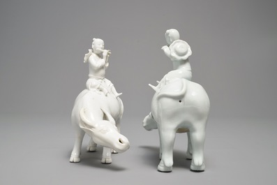 Two Chinese blanc de Chine models of fluteplayers on buffalo, 18/19th C.
