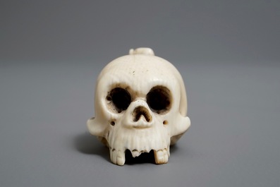 A Japanese ivory 'skull' netsuke, Meiji/Showa, 19/20th