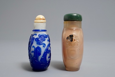 Two Chinese agate and overlay glass snuff bottles, 19/20th C.