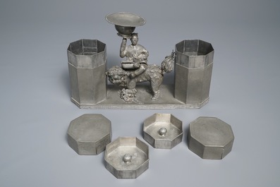 A large Chinese pewter double tea caddy with a central figure, impressed marks, 19th C.