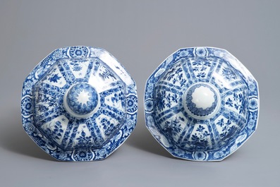 A pair of large Chinese blue and white octagonal baluster vases and covers, Kangxi