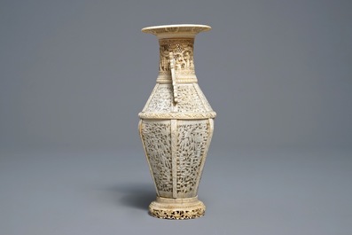 A fine Chinese reticulated ivory two-handled vase, Canton, 19th C.