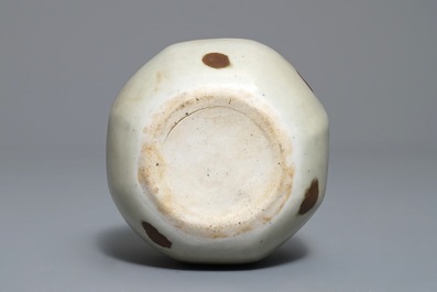 Un petit vase globulaire en porcelaine de Chine qingbai aux t&acirc;ches de rouille, Yuan