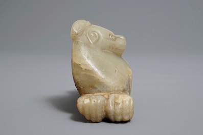 A Chinese pale greenish-grey and brown jade model of a mythical beast, Qing