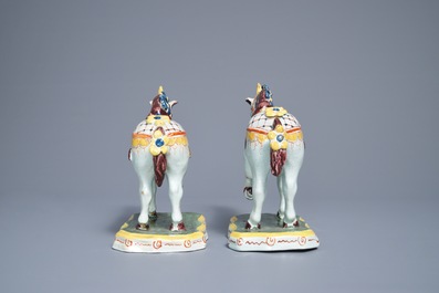 A pair of polychrome Dutch Delft models of circus horses, 19th C.