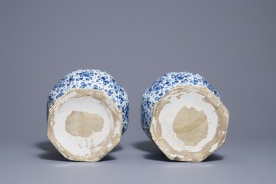 A pair of very large Dutch Delft blue and white vases, first quarter 18th C.