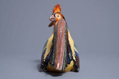 A polychrome Dutch Delft model of a rooster, 19th C.