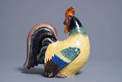 A polychrome Dutch Delft model of a rooster, 19th C.