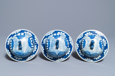 A Chinese blue and white five-piece garniture with port views, 19th C.