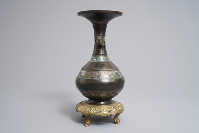 A Chinese bronze and champlev&eacute; enamel vase, 17/18th C.