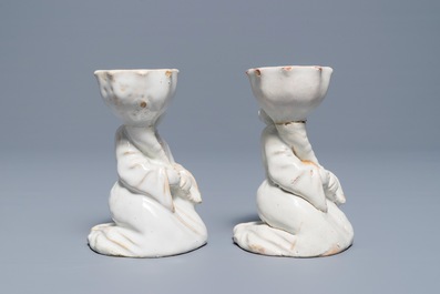 A pair of white-glazed salts in the shape of Chinamen, prob. Brussels, 18th C.