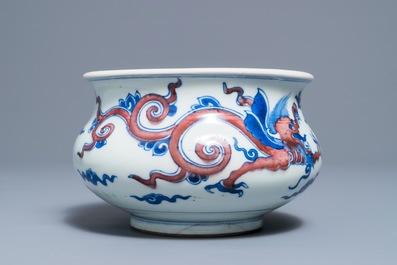A rare Chinese blue, white and copper red 'dragon' censer, Kangxi