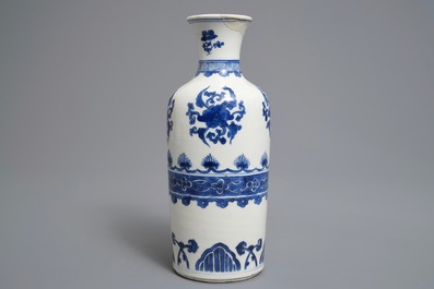 A Chinese blue and white rouleau vase with floral design, Kangxi