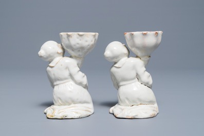 A pair of white-glazed salts in the shape of Chinamen, prob. Brussels, 18th C.