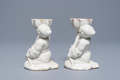 A pair of white-glazed salts in the shape of Chinamen, prob. Brussels, 18th C.