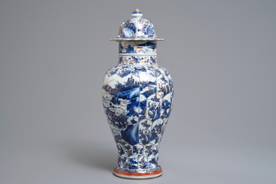 A Chinese clobbered blue and white vase and cover with landscape design, Kangxi