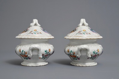 A pair of Chinese famille rose Dutch market armorial tureens on stands, arms of Nauta Beuckens and Swalue accoll&eacute;, Qianlong