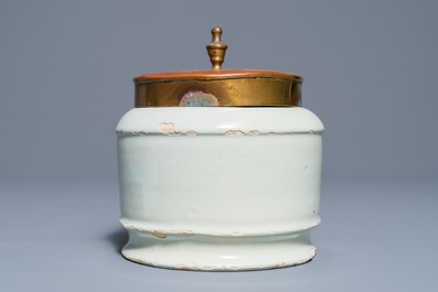 A polychrome Dutch Delft drug jar with brass lid, early 19th C.