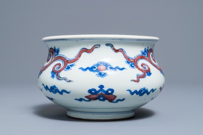 A rare Chinese blue, white and copper red 'dragon' censer, Kangxi