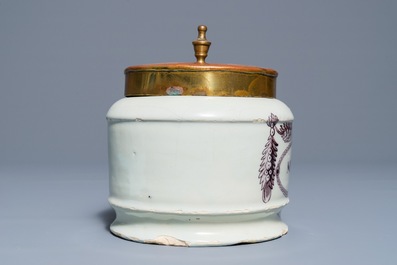 A polychrome Dutch Delft drug jar with brass lid, early 19th C.