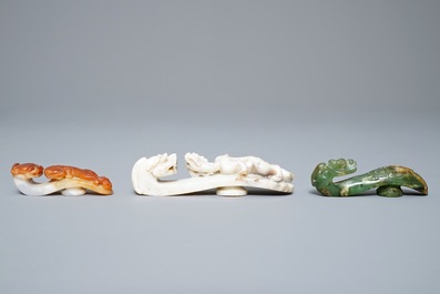 Three Chinese jade belt hooks, 19th C.