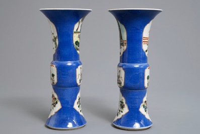 A pair of Chinese famille verte on powder blue ground gu vases, Kangxi mark, 19th C.